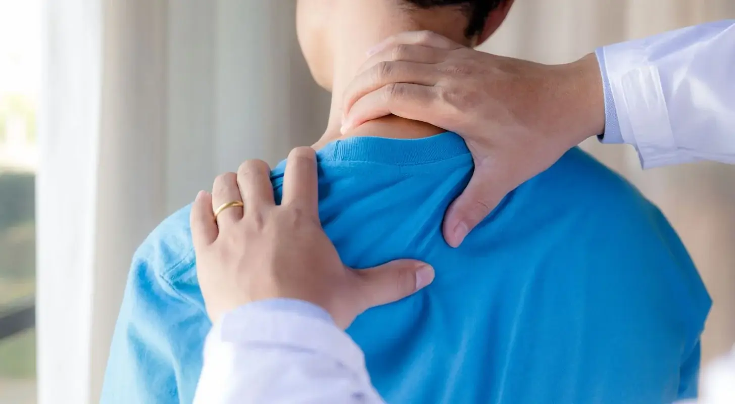 Man receiving a chiropractic adjustment